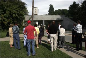 Jurors view the bridge from which Jamie Pacheco is accused of throwing a steel plate.
