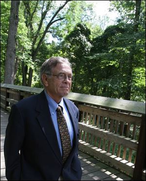 The quiet and serenity of Wildwood Preserve Metropark offer Jack Gallon an opportunity to collect his thoughts while enjoying the outdoors.