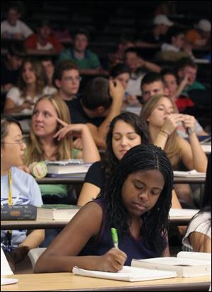 Shley Moncrief at work in her general chemistry class in UT's Rocket Hall.