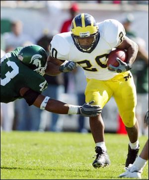 Mike Hart ran for 218 yards on 36 carries and scored a touchdown in Michigan's victory.