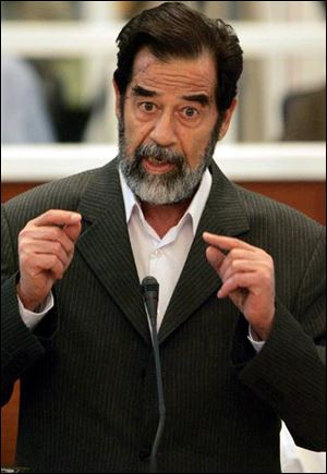 Saddam Hussein testifies at his trial in Baghdad today. Afterward, a judge adjourned the trial until Nov. 28.