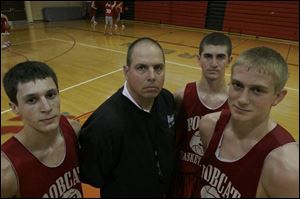 Bowling Green coach Von Graffi n is counting on the experience of a senior class that includes, from left, guard Jeremiah
Kollar and forwards Brandon Radabaugh and Ryan Hoehner. Hoehner averaged 17.7 points per game last year.
