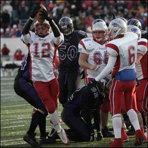 Patrick Henry's Tom Busch celebrates after recovering a Cincinnati Hills Christian Academy fumble on Friday.