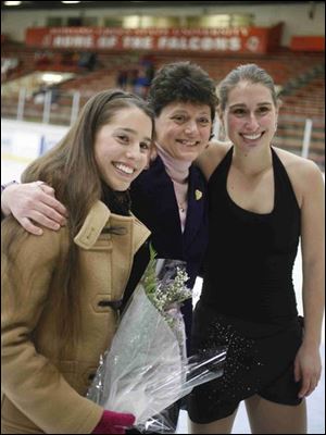 Bowling Green's Alissa Czisny, left, her coach, Shelly Bressler, and her twin sister, Amber, pose at a send-off celebration.