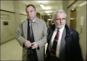 Coin dealer and GOP fund-raiser Tom Noe, left, arrives at the Lucas County Courthouse with attorney Jon Richardson.
