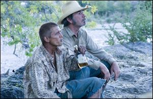 Barry Pepper and Tommy Lee Jones in <i>The Three Burials of Melquiades Estrada</i>.