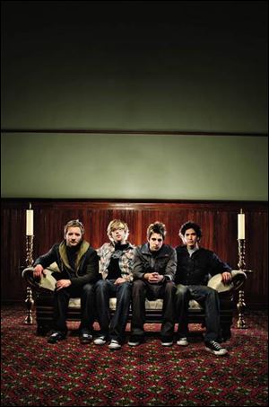 Members of Sanctus Real from left: Mark Graalman, new bassist Dan Gartley, Matt Hammitt, and Chris Rohman.