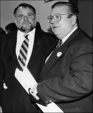 Bob McCloskey and Peter Ujvagi wait for voting results in November, 1993. That night Mr. McCloskey was elected to serve as the first District 3 councilman.