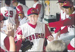 Toledo pitcher Zach Miner is all smiles as he leaves the field after eight 
innings against Indianapolis. He struck out eight and gave up two hits. 