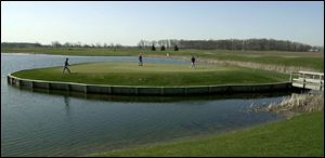 Water can become a factor on No. 8 at The Legacy in Ottawa Lake, Mich. The Island Resort there can provide golfers with lodging as they attempt to conquer the course.
