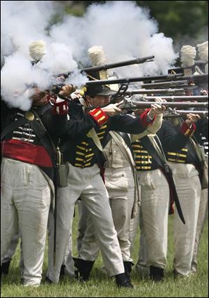 Smith fires his musket in the tactical demonstration at Fort Meigs State Memorial in Perrysburg.