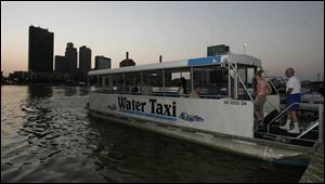 The water taxi picks up passengers on the eastern bank of the Maumee River.