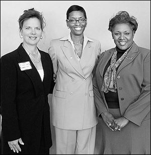 Cindy Dana, left, Donna James, and Johnetta McCollough at the benefit luncheon for the Polly Fox Academy.
