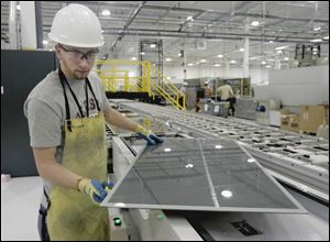 The Perrysburg Township plant is the only one now making panels, in a process that uses fewer materials than competitors'. 