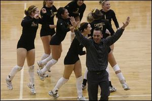 Perrysburg coach Jeff Beck reacts to his team knocking off St. Ursula to win the Division I regional championship.
