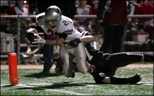 Sean Brickner stretches but can t quite get into the end zone on this play for Hopewell-Loudon in last night s regional final.