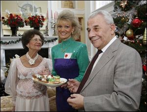 Traci Schwann, center, with her mother-in-law Grazyna Schwann and father-in-law Stefan Schwann.