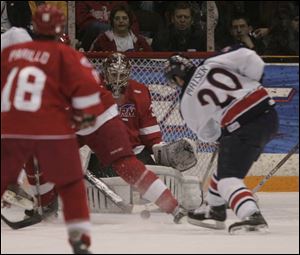 Dayton's Justin Maiser scores on Toledo goalie Mike Brodeur early last night before 5,069 fans at the Sports Arena.