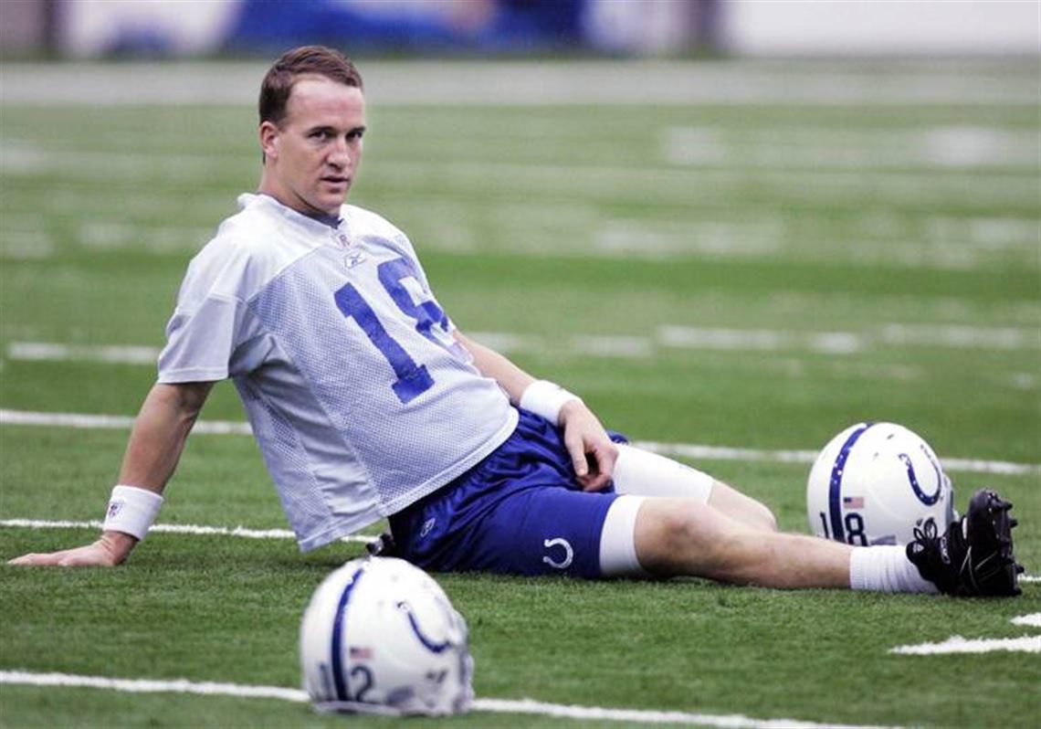 Indianapolis Colts' quarterback Peyton Manning signals a play to