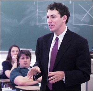 Lucas County Commissioner Ben Konop talks to seniors at Toledo Christian School as part of a 2-week tour gathering input from area high school seniors.