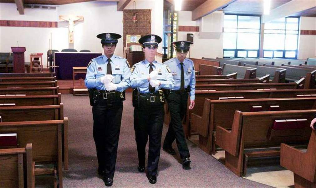 Tearful-honor-guard-prepares-for-officer-s-funeral