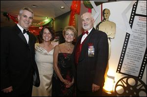 Chris and Ann Kozak, left, with Dee and Lance Talmage at the Red Cross  Oscar Night  fund-raiser.
