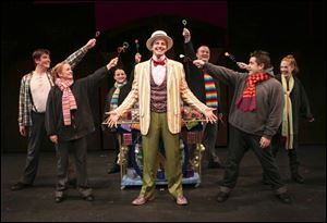  Candy Man  Steve Tipton in Willy Wonka is surrounded by,
from left, Eric Thompson, Roe Kizeik, Rachel Brennan, Matthew
A. Anderson, Jeffrey Scott Bailey, and Tara Garwood.
