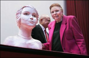 Artist Joe Ann Cousino unveils her sculpture of Springfield native and Hollywood legend Lillian Gish.