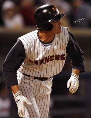 Toledo's Jack Hannahan watches his first home run of the season clear the fence in the sixth inning to tie the game.