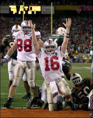 Craig Krenzel celebrates one of his two touchdowns against Miami when Ohio State won a national title in January, 2003.