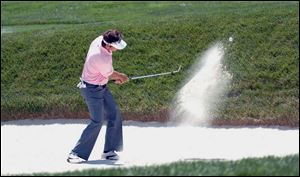 First-round leader Nick Dougherty hits out of the bunker on the 11th hole during the second round at the U.S. Open.