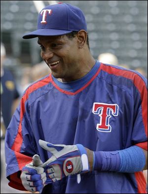 Sammy Sosa smiles after batting practice before Wednesday night's game.