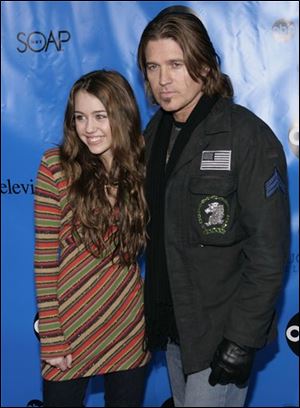 Miley Cyrus, left, and Billy Ray Cyrus
<br>
(ASSOCIATED PRESS)
<br>
<img src=http://www.toledoblade.com/graphics/icons/photo.gif> <b><font color=red>View</font></b> <a href=