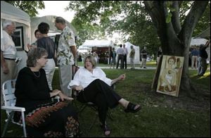 Cindy Felver, left, of Dayton, and Kathy Funderburg of Bryan, Ohio, at the Crosby Festival of the Arts.