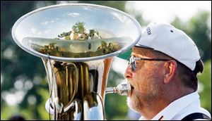 Dan Duvendack puts some oomph in the music provided by the Deurschmeister German Band.