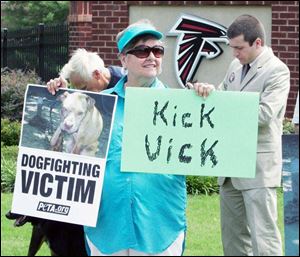 Jean Pritchett of Flowery Branch, Ga., participates in a PETA protest of Atlanta Falcons quarterback Michael Vick.