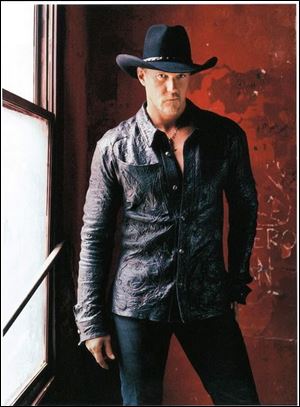 Trace Adkins' hits include 'Ladies Love Country Boys' and 'HonkyTonk Badonkadonk.'