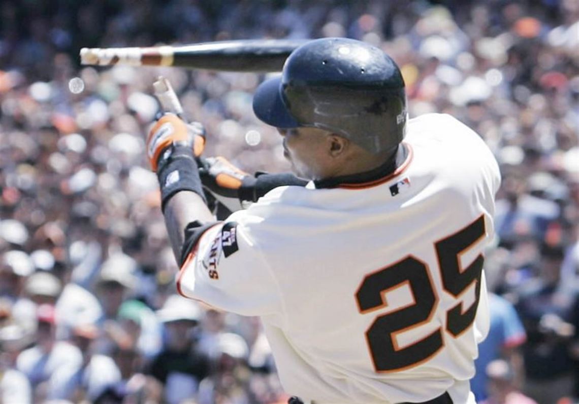 Barry Bonds Hi Fives bat boy after hitting his 73rd home run