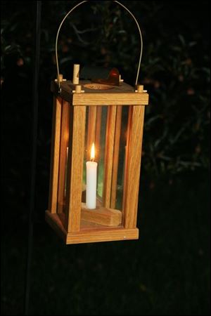 A wooden lantern was used on the Historical Lantern Tour.