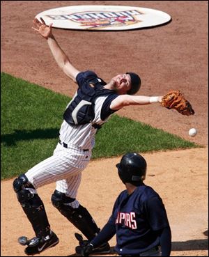 Mud Hens catcher Andrew Graham lets a foul pop drop that would have ended the game with a Toledo victory.