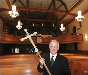 The Rev. Richard Powell II in St. Paul Evangelical Church downtown. The church is celebrating its 150th anniversary this weekend.