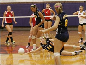 Senior Jordan Goad dives to make a play for the Eagles. Goad has 577 assists this season and 72 kills.