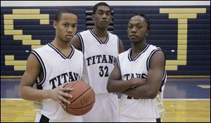 St. John's has experience with, from left, Michael Taylor, Tim Simmons and Jay Springs. The
Titans lost the City League final to Libbey last year but defeated the Cowboys in the district.