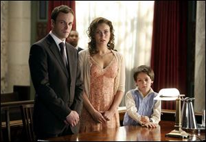 Laura Benanti plays a woman from the past of lawyer Eli Stone (Johnny Lee Miller), left, and William Topputo plays her son. The new drama begins its run at 10 p.m. Thursday, after the season premiere of <i>Lost</i>.