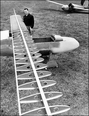 Richard Schreder stands next to the frame of a glider under construction in April, 1957. Many of the sailplanes he designed and built over the years are still flying.