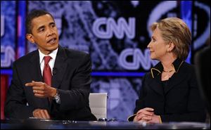 Democratic presidential hopefuls Sen. Barack Obama and Sen. Hillary Rodham Clinton debate at the Recreational Sports Center on the University of Texas campus in Austin, Texas.