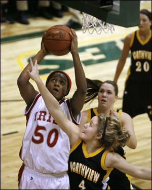 Central s Brianna Jones shoots over Northview s Kate Schmidt (4) and Olivia Fouty.
