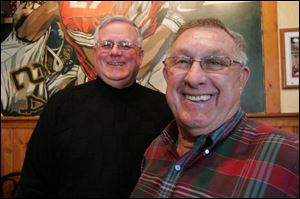 Dick Crowell, left, won 284 high school games, mostly at
Bowsher. Larry Clark posted 442 wins, mostly at Perrysburg.