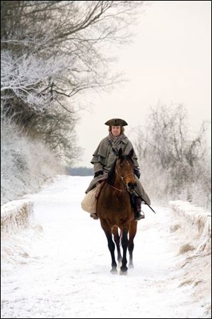 Paul Giamatti, who bears some resemblance to John Adams, in a scene from the seven-part series.