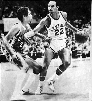 Kentucky's Truman Claytor drives againts UNLV's Tony Smith in a 1978 game. Claytor averaged 6.9 points that season